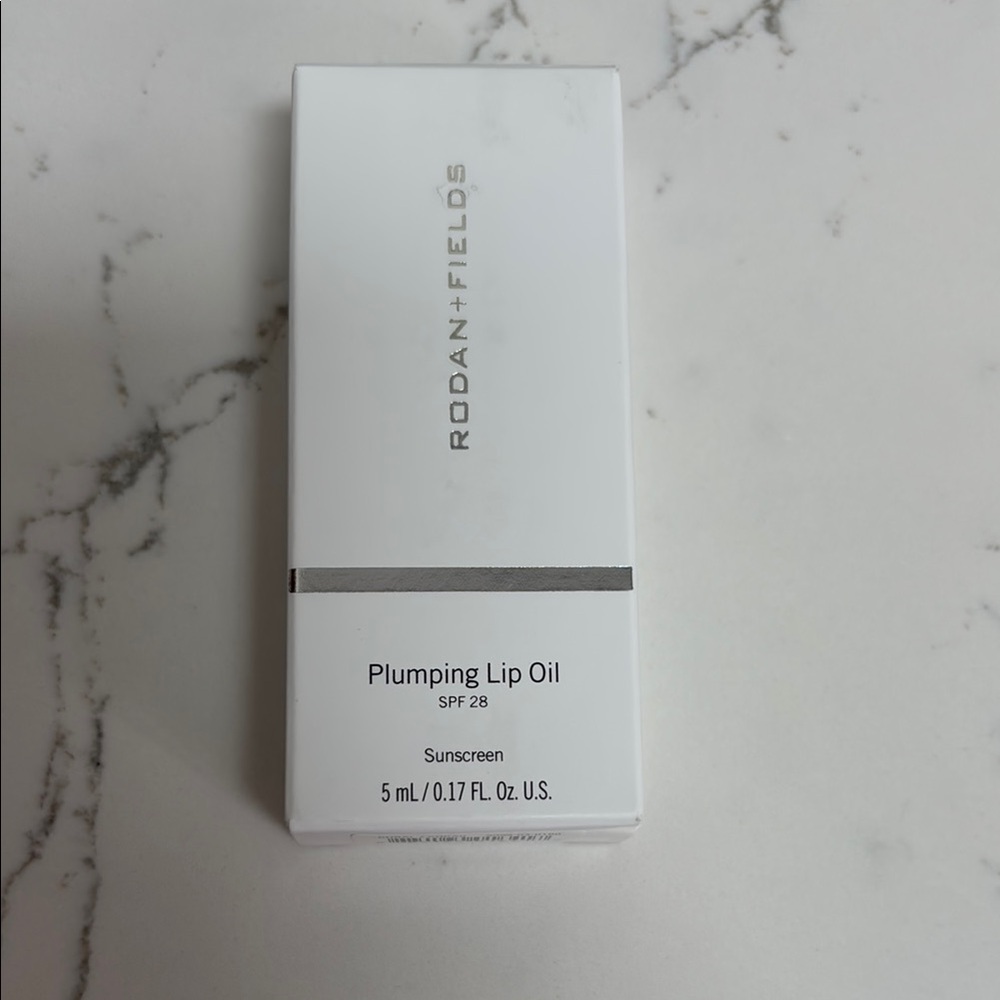 Rodan + Fields Lip Oil with SPF 28 in White